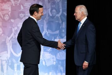 democrat senator chris murphy shaking hands with biden