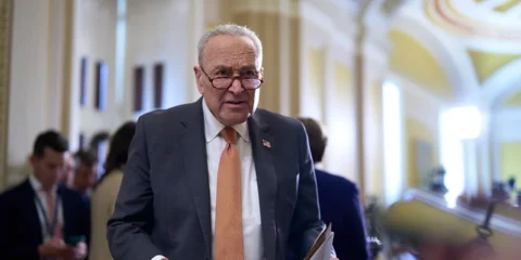 chuck schumer with glasses on