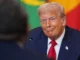 trump grinning