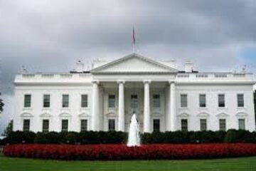 white house with cloudy sky