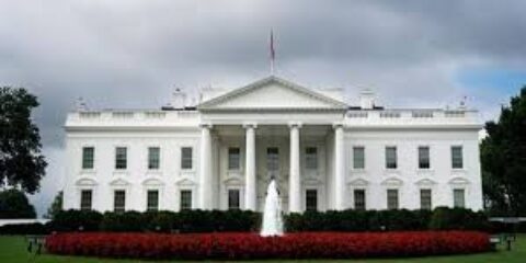 white house with cloudy sky