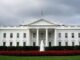 white house with cloudy sky