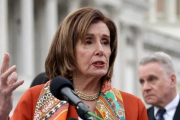 nancy pelosi hand up