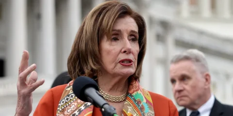 nancy pelosi hand up