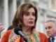 nancy pelosi hand up