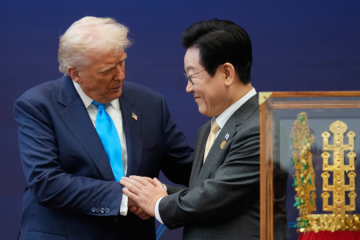 trump shaking hands with myung