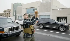 Michigan City Pops Off as Activist Slaps Bacon at Quran Before Arrival of Police