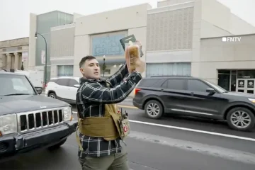 jake lang hitting quran with bacon
