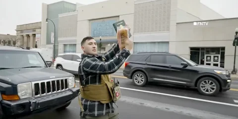 jake lang hitting quran with bacon